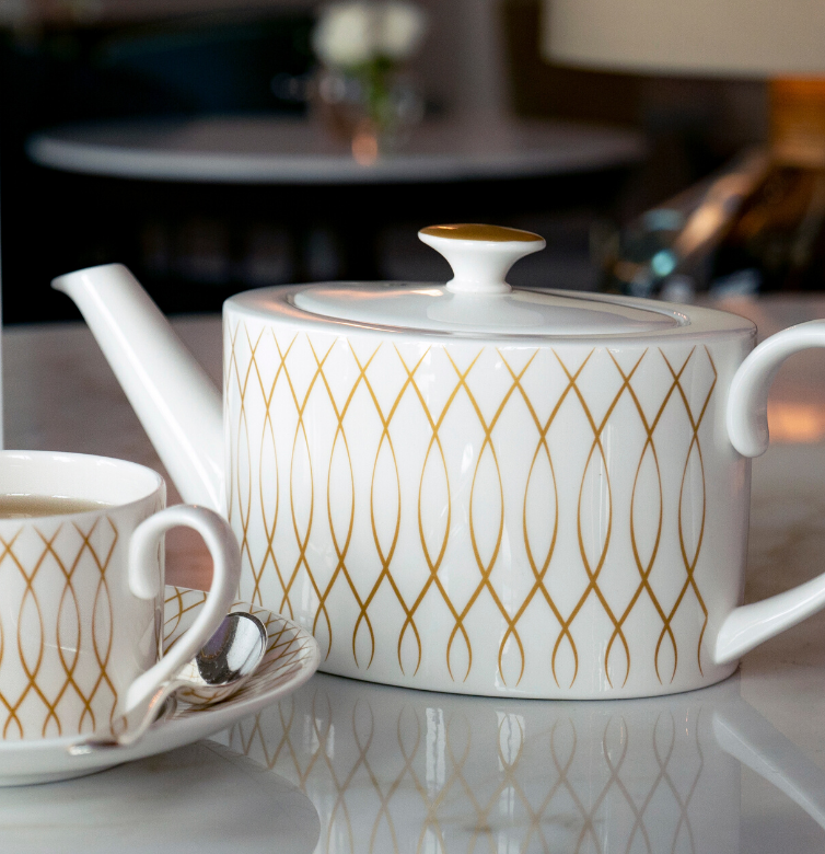 Bespoke patterned teapot with a tea cup and saucer